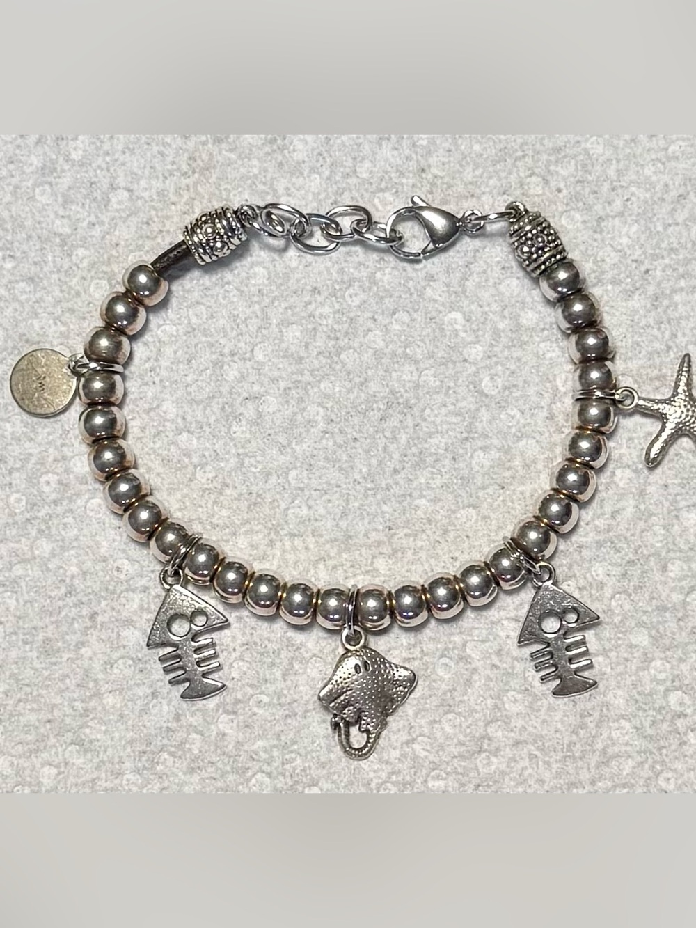 Silver Beaded Charm Bracelet.